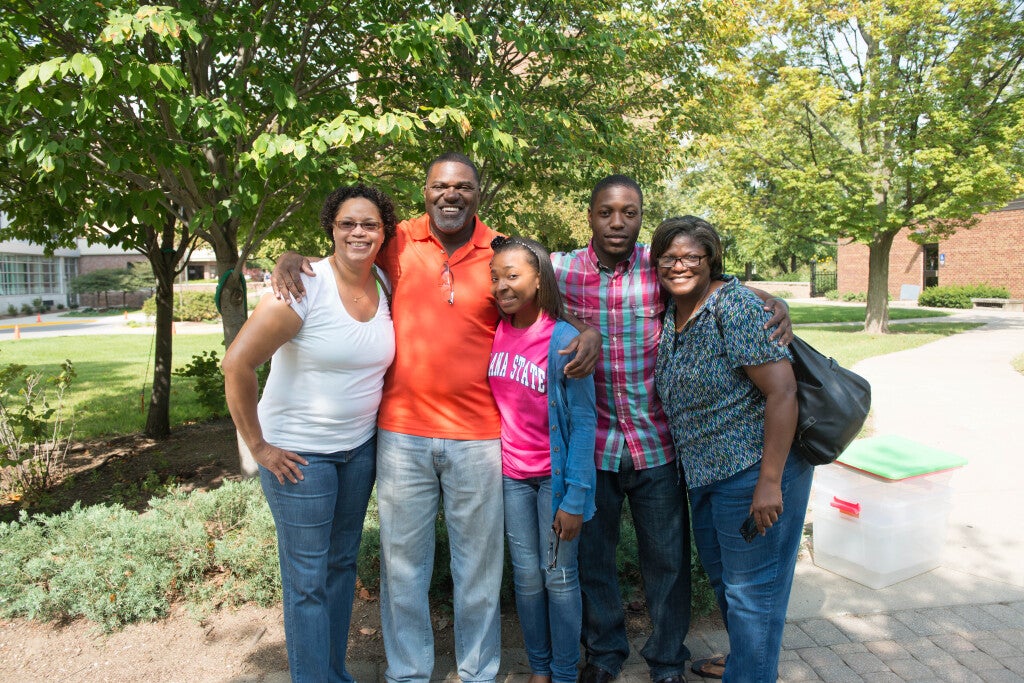 Proxy Access image of a happy family being to gether on the Indiana State University campus. 