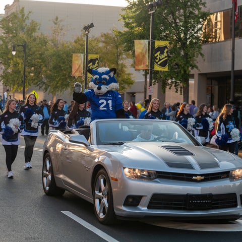 Sycamore Sam in the back of a car during the Homecoming parade
